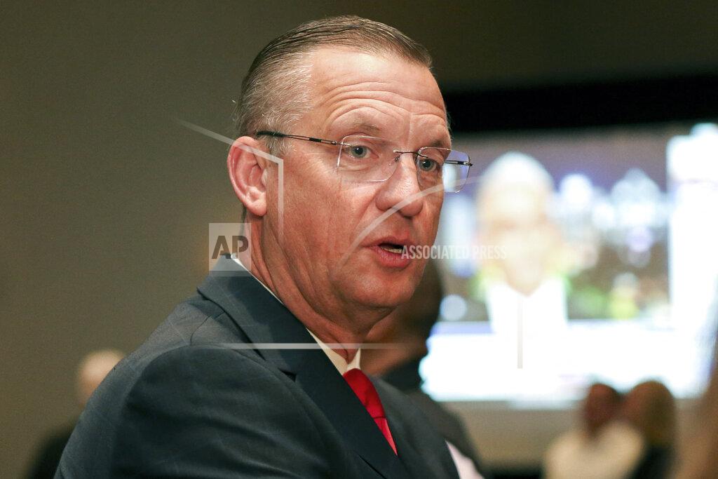 Brett Davis Republican candidate for Senate Rep. Doug Collins attends an election night watch party in Buford, Ga., Tuesday, Nov. 3, 2020. (AP Photo/Brett Davis)