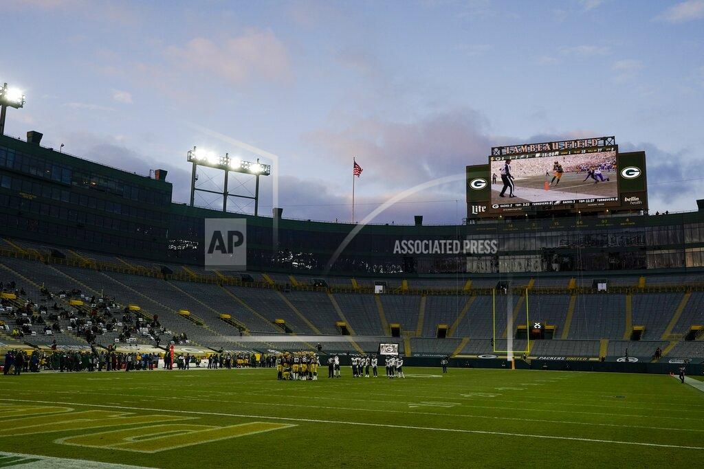 Morry Gash The seats are nearly empty at Lambeau Field during the second half of an NFL football game between the Green Bay Packers and the Philadelphia Eagles Sunday, Dec. 6, 2020, in Green Bay, Wis. (AP Photo/Morry Gash)