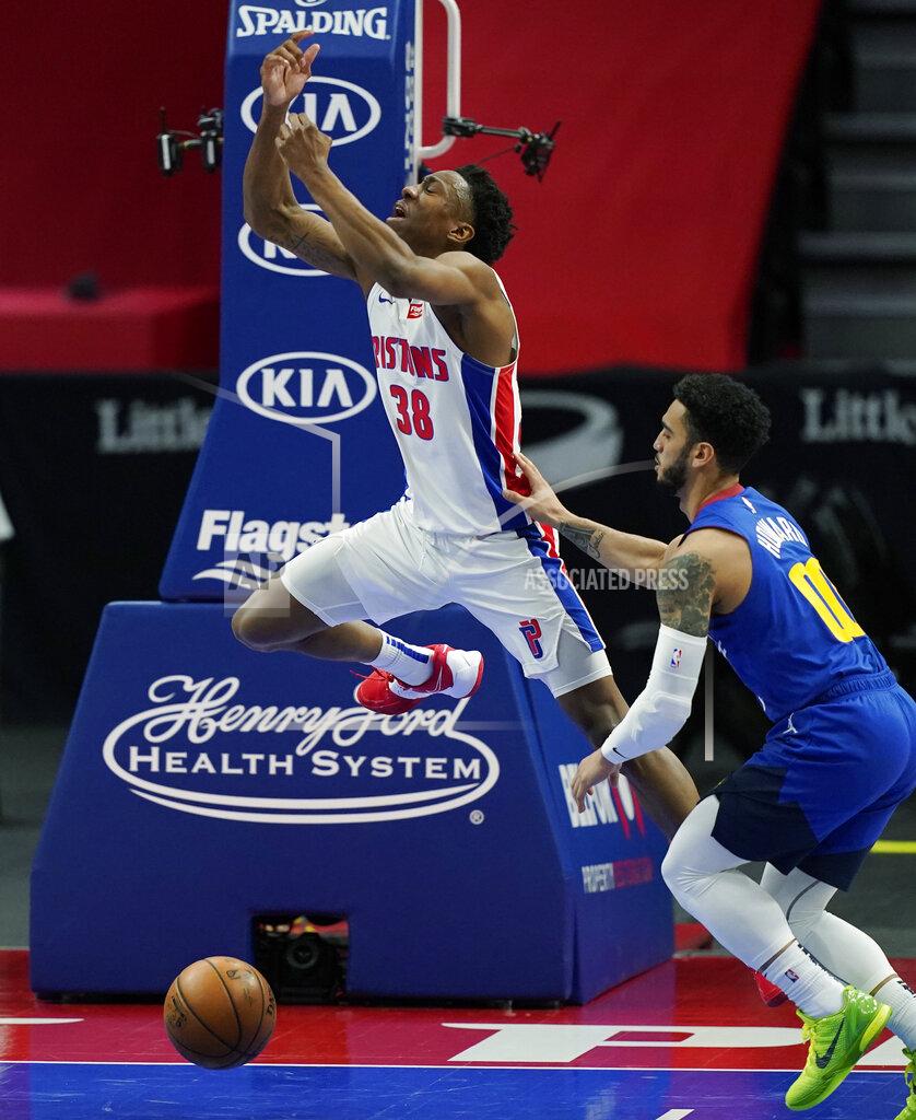 Carlos Osorio Detroit Pistons guard Saben Lee (38) loses control of the ball as Denver Nuggets guard Markus Howard (00) defends during the first half of an NBA basketball game, Friday, May 14, 2021, in Detroit. (AP Photo/Carlos Osorio)