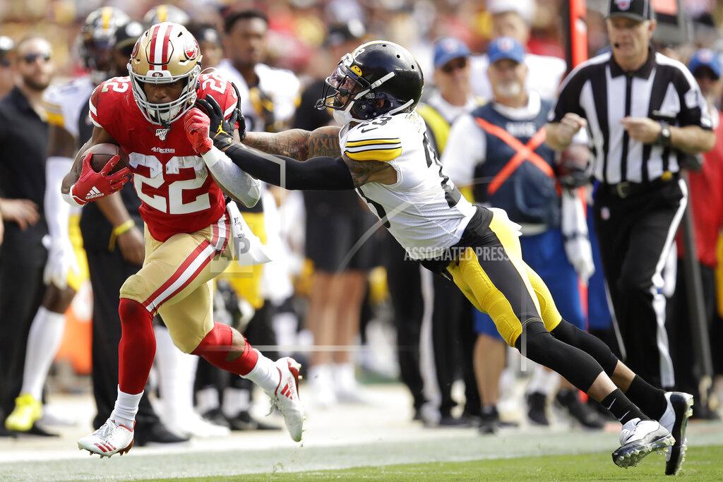 Ben Margot San Francisco 49ers running back Matt Breida (22) is pushed out of bounds by Pittsburgh Steelers cornerback Joe Haden during the first half of an NFL football game in Santa Clara, Calif., Sunday, Sept. 22, 2019. (AP Photo/Ben Margot)