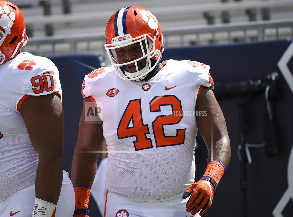 Jon Barash FILE - In this Sept. 22, 2018, file photo, Clemson defensive lineman Christian Wilkins (42) warms up before the first half of an NCAA college football game against Georgia Tech, in Atlanta. Wilkins has 6½ tackles for loss, including two sacks, and eight quarterback pressures on the season for the second-ranked Tigers’ stingy defense. (AP Photo/Jon BarashNY151)