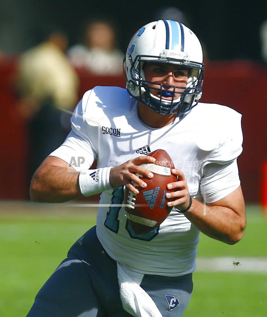 Butch Dill Citadel running back Brandon Rainey (16) scrambles for yardage during the first half of an NCAA college football game against Alabama, Saturday, Nov. 17, 2018, in Tuscaloosa, Ala. (AP Photo/Butch Dill)