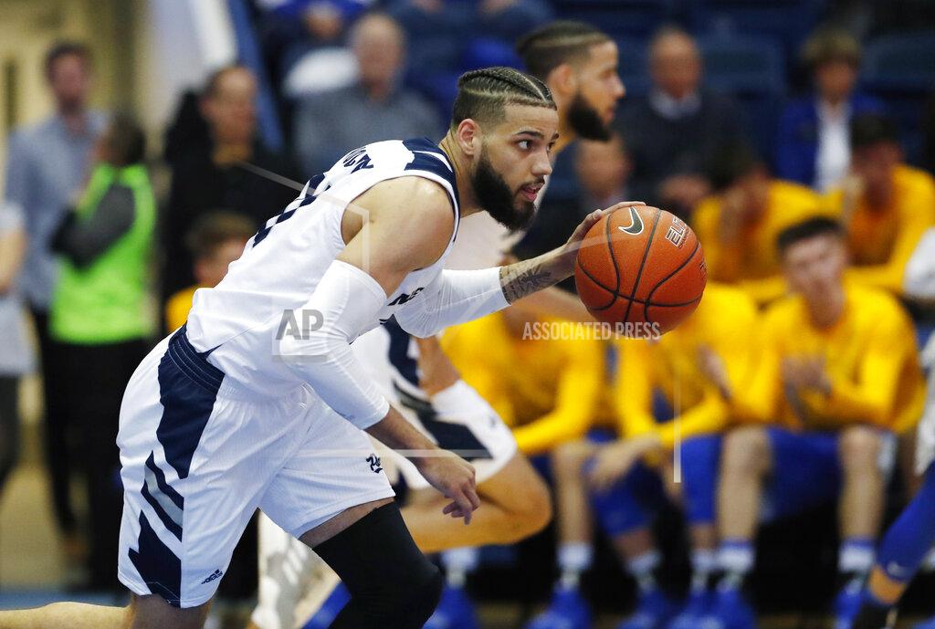 David Zalubowski Nevada forward Cody Martin picks up a loose ball during the second half of the team's NCAA college basketball game against Air Force on Tuesday, March 5, 2019, at Air Force Academy, Colo. Nevada won 90-79. (AP Photo/David Zalubowski)