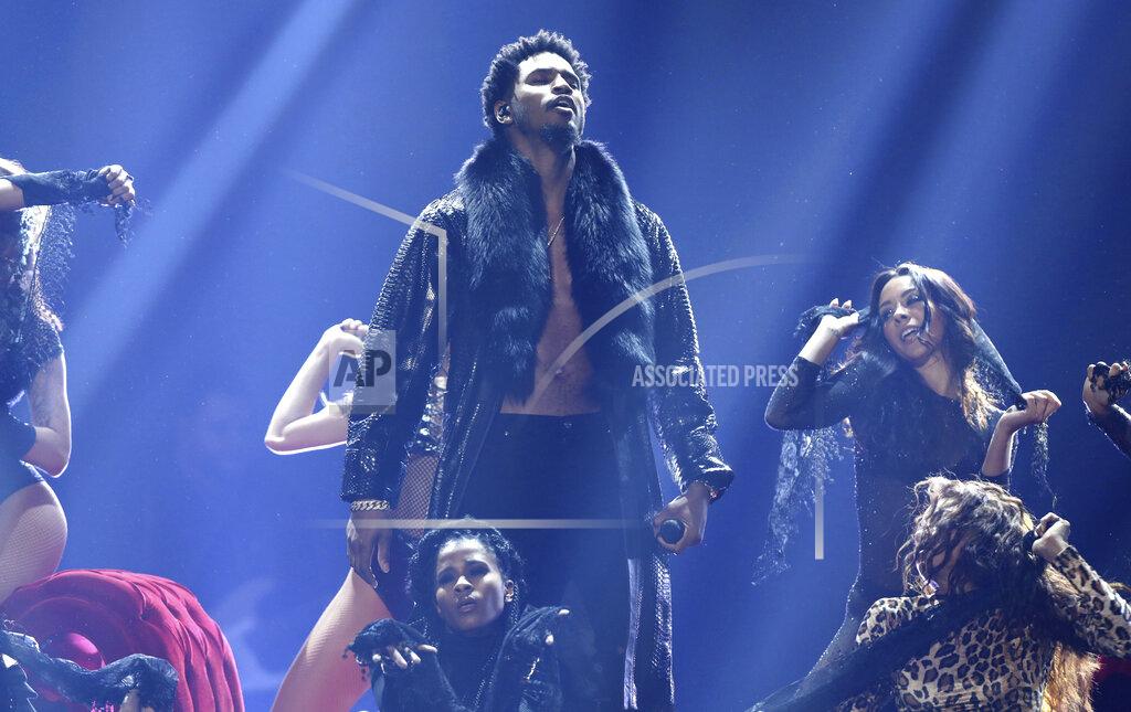 Matt Sayles FILE - Trey Songz performs at the BET Awards in Los Angeles on June 25, 2017. Songz was arrested during the AFC Championship game in Kansas City, Mo., after police said he refused to wear a mask and then punched an officer who was trying to remove him from the stadium. Songz, whose name is Tremaine Aldon Neverson, was released Monday, Jan. 25, 2021, from the Jackson County jail. (Photo by Matt Sayles/Invision/AP, File)
