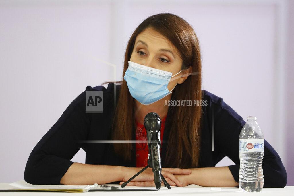 Kathy Willens Michelle Caruso-Cabrera, a candidate in the Democratic primary for the seat held by Rep. Alexandria Ocasio-Cortez, listens during a debate against Ocasio-Cortez and Badrun Khan, Wednesday, June 17, 2020, in New York. (AP Photo/Kathy Willens)