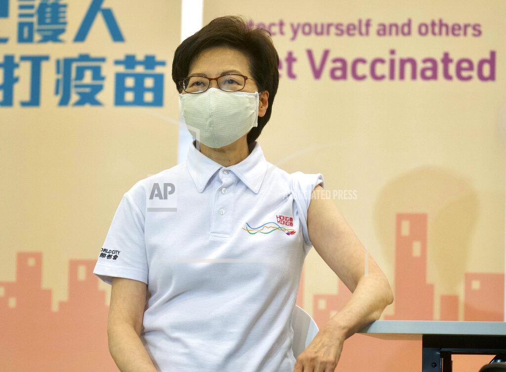 Vincent Yu Hong Kong Chief Executive Carrie Lam waits to receive COVID-19 vaccinations at a Community Vaccination Centre in Hong Kong Monday, Feb. 22, 2021. Hong Kong leader Carrie Lam and a host of other government officials on Monday received the COVID-19 vaccine developed by Chinese biopharmaceutical company Sinovac, as the city prepares to roll out its vaccination program. (AP Photo/Vincent Yu)