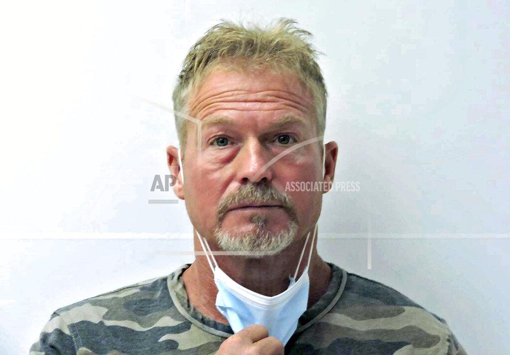 Uncredited FILE - This undated file photo provided by the Chaffee County (Colo.) Sheriff's Office shows Barry Morphew in Salida, Colo. According to a court document released Monday, Sept. 20, 2021, investigators allege that Morphew, charged with killing his missing wife, decided to "hunt and control" her like an animal after she insisted on leaving him and later changed his statements as evidence in the case developed. (Chaffee County Sheriff's Office via AP, File)