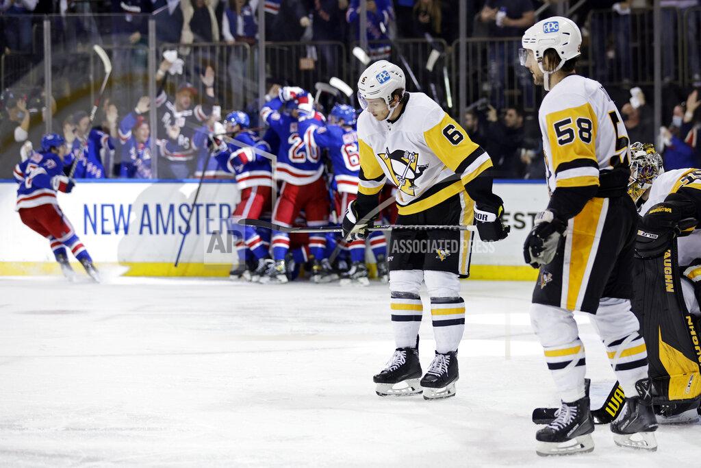 Adam Hunger Pittsburgh Penguins defenseman John Marino (6) reacts after New York Rangers left wing Artemi Panarin scored the game winning goal during overtime in Game 7 of an NHL hockey Stanley Cup first-round playoff series, Sunday, May 15, 2022, in New York. The Rangers won 4-3 in overtime. (AP Photo/Adam Hunger)