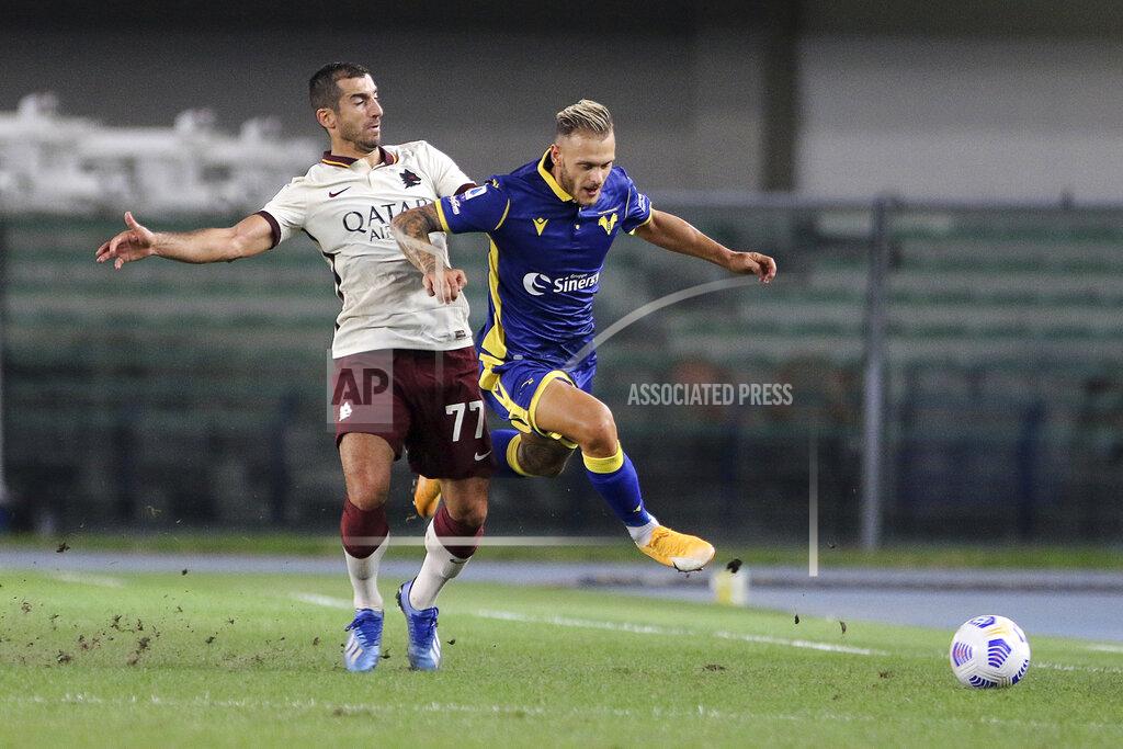Paola Garbuio Verona's Federico Dimarco, right, and Roma's Henrikh Mkhitaryan compete for the ball during an Italian Serie A soccer match between Verona and Roma at the Bentegodi stadium in Verona, Italy, Saturday, Sept. 19, 2020. (Paola Garbuio/LaPresse via AP)