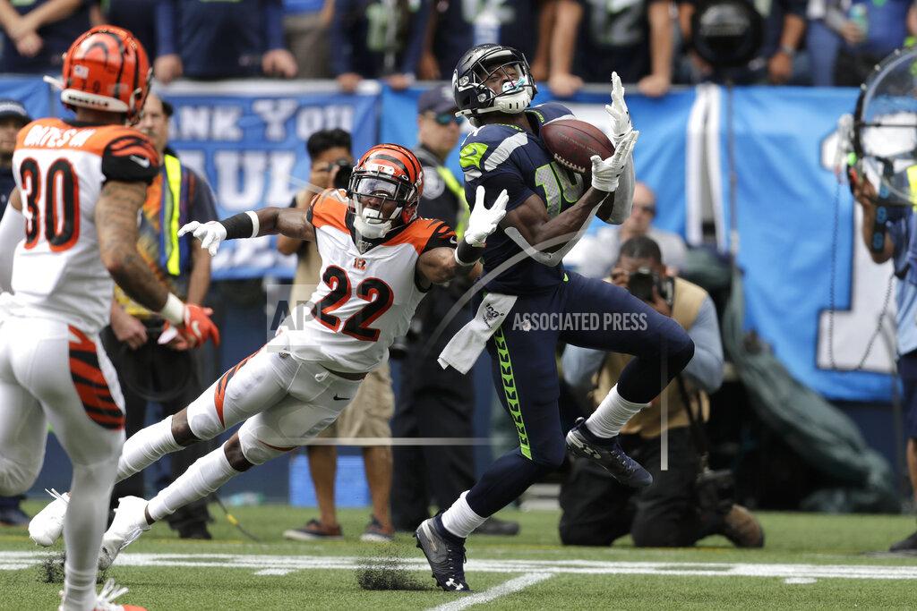 Stephen Brashear Seattle Seahawks wide receiver DK Metcalf right, makes a catch over Cincinnati Bengals cornerback William Jackson (22) during the first half of an NFL football game Sunday, Sept. 8, 2019, in Seattle. (AP Photo/Stephen Brashear)