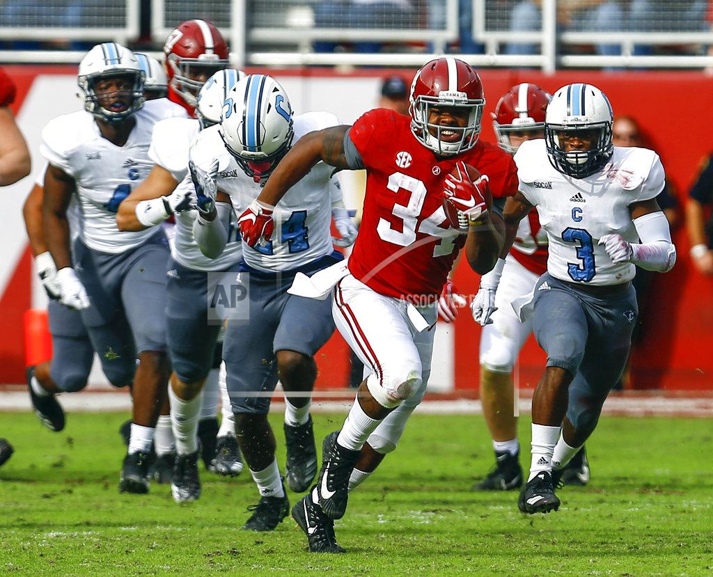 Butch Dill Alabama running back Damien Harris (34) carries the ball against Citadel during the second half of an NCAA college football game, Saturday, Nov. 17, 2018, in Tuscaloosa, Ala. (AP Photo/Butch Dill)