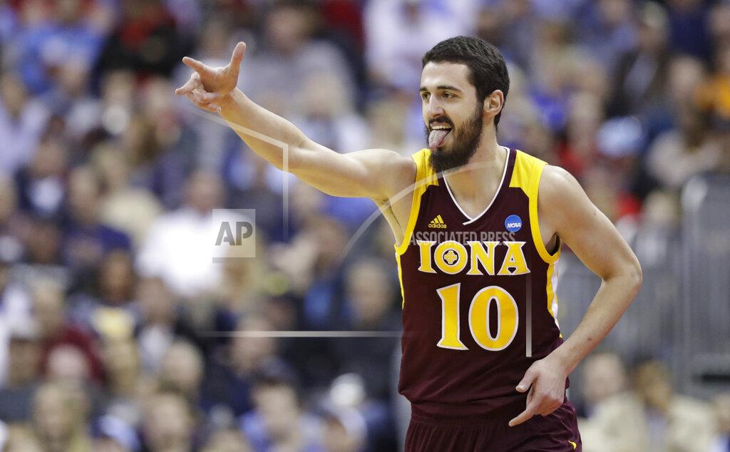 Tony Dejak Iona's Andrija Ristanovic reacts after hitting a three-point basket in the first half against North Carolina during a first round men's college basketball game in the NCAA Tournament in Columbus, Ohio, Friday, March 22, 2019. (AP Photo/Tony Dejak)