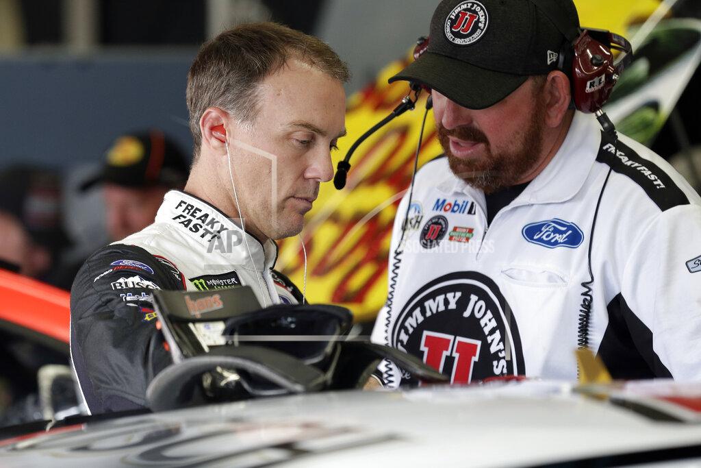 Gerry Broome Kevin Harvick, left, prepares to practice for Sunday's NASCAR Cup Series auto race at Charlotte Motor Speedway in Concord, N.C., Saturday, Sept. 28, 2019. (AP Photo/Gerry Broome)