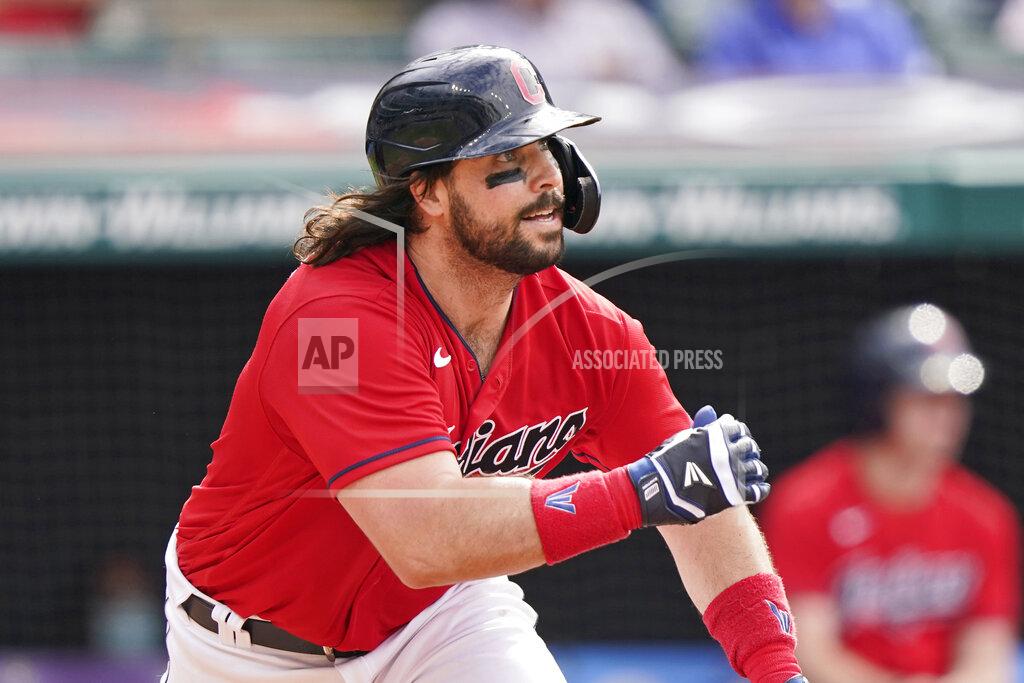 Tony Dejak Cleveland Indians' Austin Hedges watches his RBI-single in the second inning of a baseball game against the Minnesota Twins, Saturday, May 22, 2021, in Cleveland. (AP Photo/Tony Dejak)