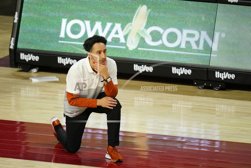 Charlie Neibergall Texas head coach Shaka Smart watches from the bench during the first half of an NCAA college basketball game against Iowa State, Tuesday, March 2, 2021, in Ames, Iowa. (AP Photo/Charlie Neibergall)