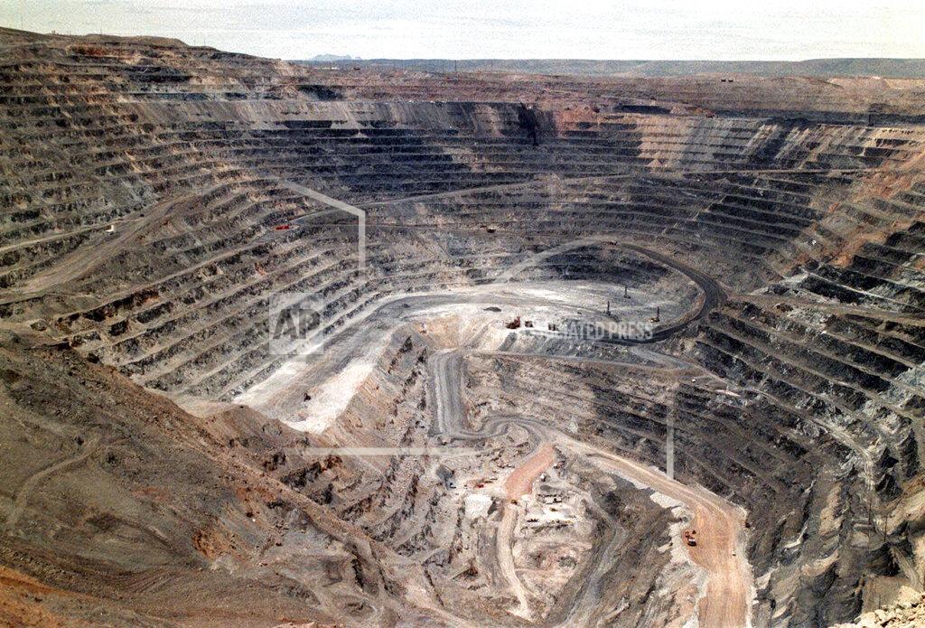 FILE - This undated file photo shows Barrick Goldstrike Mines' Betze-Post open pit near Carlin, Nev. A Nevada judge has rejected an effort by rural counties to big mining interests to block a move in the state Legislature to raise taxes on mining companies. Judge James Wilson in Carson City declined Thursday, Jan. 28, 2021, to rule on what he called a legislative matter while the process is still underway. (Adella Harding/The Daily Free Press via AP, File)