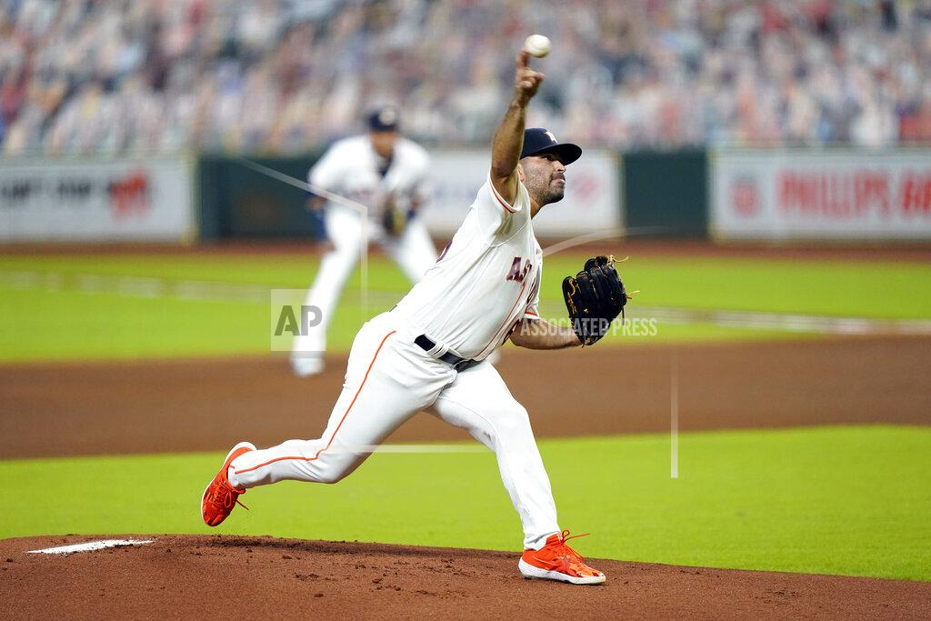 David J. Phillip Houston Astros starting pitcher Jose Urquidy throws against the Texas Rangers during the first inning of a baseball game Tuesday, Sept. 15, 2020, in Houston. (AP Photo/David J. Phillip)