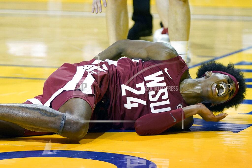 Jeff Chiu Washington State guard Noah Williams (24) reacts after falling to the floor while shooting against Stanford during the first half of an NCAA college basketball game in Santa Cruz, Calif., Saturday, Jan. 9, 2021. (AP Photo/Jeff Chiu)
