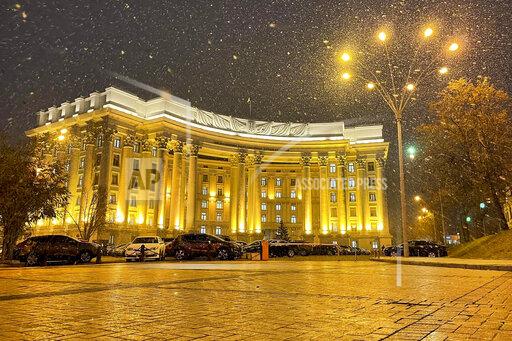 In this undated handout photo released by Ukrainian Foreign Ministry Press Service, the building of Ukrainian Foreign Ministry is seen during snowfall in Kyiv, Ukraine. Ukrainian officials and media reports say a number of government websites in Ukraine are down after a massive hacking attack. While it is not immediately clear who was behind the attacks, they come amid heightened tensions with Russia and after talks between Moscow and the West failed to yield any significant progress this week. (Ukrainian Foreign Ministry Press Service via AP)