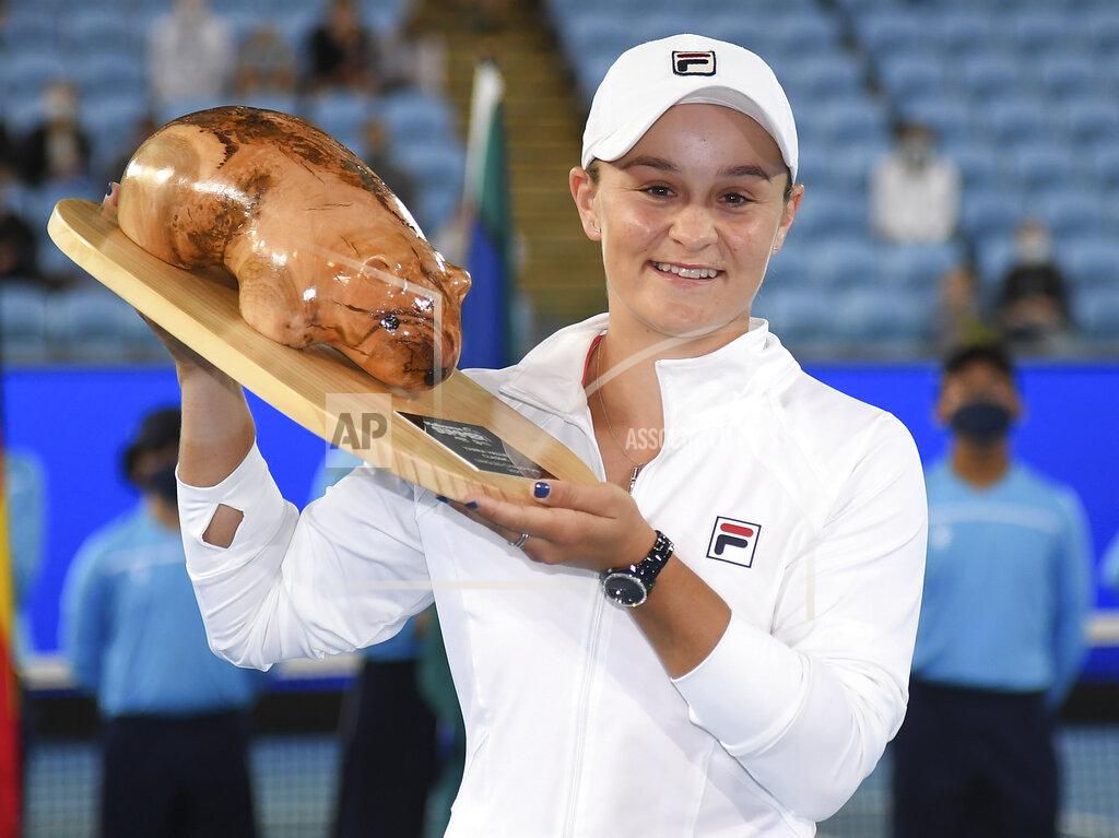 Andy Brownbill Australia's Ash Party holds her trophy after defeating Spain's Garbine Muguruza in the final of the Yarra Valley Classic in Melbourne, Australia, Sunday, Feb. 7, 2021.(AP Photo/Andy Brownbill)