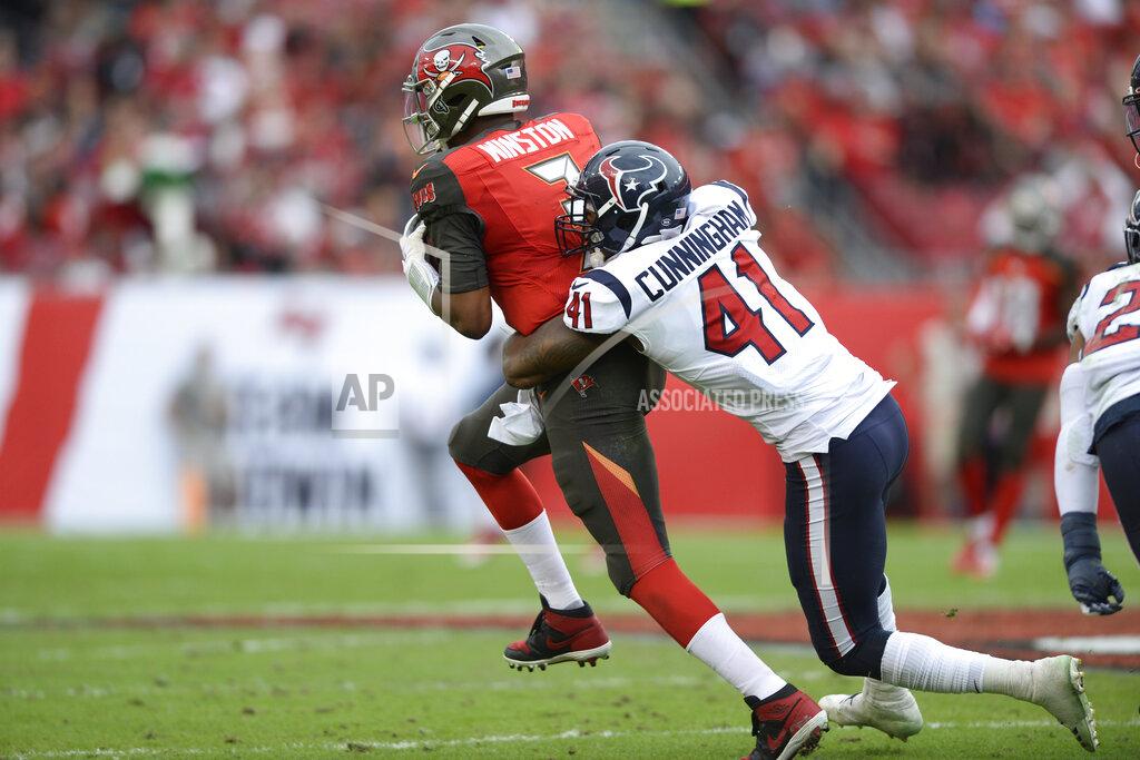 Jason Behnken FILE - Houston Texans inside linebacker Zach Cunningham (41) sacks Tampa Bay Buccaneers quarterback Jameis Winston (3) during the second half of an NFL football game Saturday, Dec. 21, 2019, in Tampa, Fla. The Houston Texans have signed inside linebacker Zach Cunningham to a four-year, $58 million contract extension. The Texans announced the signing on Monday, Aug. 31, 2020. (AP Photo/Jason Behnken, File)