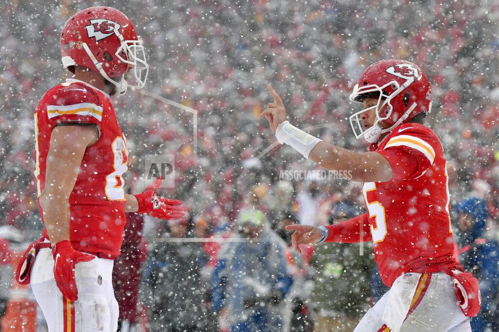Ed Zurga Kansas City Chiefs quarterback Patrick Mahomes, right, celebrates a touchdown by wide receiver Tyreek Hill with tight end Travis Kelce, left, during the second half of an NFL football game against the Denver Broncos in Kansas City, Mo., Sunday, Dec. 15, 2019. (AP Photo/Ed Zurga)