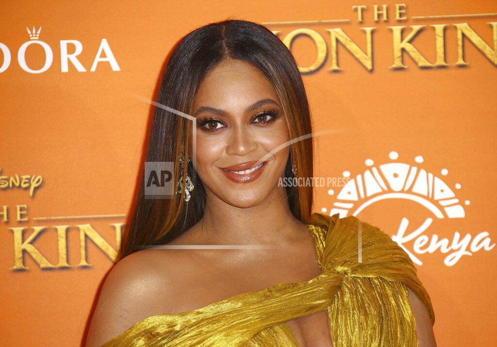 Joel C Ryan FILE - This July 14, 2019 file photo shows Beyonce at the "Lion King" premiere in London. President Barack Obama along with his wife, Michelle, delivered speeches Sunday, June 7, 2020, during YouTube’s “Dear Class of 2020” virtual ceremony. The duo, along with a wide-ranging, star-studded lineup including Beyoncé, Lady Gaga and Tom Brady, offered inspirational messages in hopes of uplifting new graduates. (Photo by Joel C Ryan/Invision/AP, File)