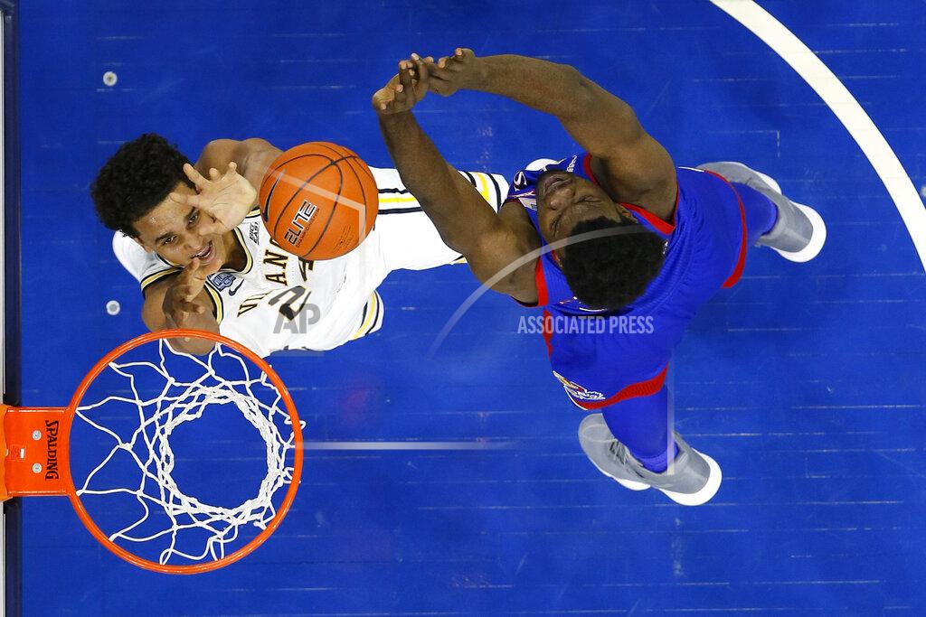 Matt Slocum Villanova's Jeremiah Robinson-Earl, left, goes up for a shot against Kansas' Udoka Azubuike during the second half of an NCAA college basketball game, Saturday, Dec. 21, 2019, in Philadelphia. (AP Photo/Matt Slocum)