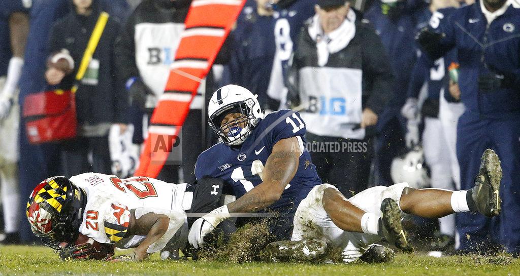 Chris Knight Penn State's Micah Parsons (11) drags down Maryland's Javon Leake (20) for a loss during the second half of an NCAA college football game in State College, Pa., Saturday, Nov. 24, 2018. Penn State won 38-3. (AP Photo/Chris Knight)