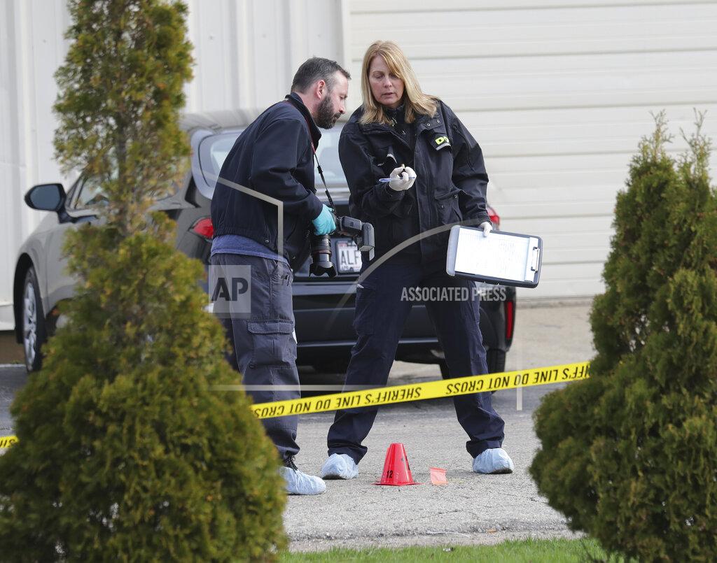 Mike De Sisti Officials investigate the scene of a deadly shooting at Somers House Tavern in Kenosha, Wis., Sunday, April 18, 2021. Several people were killed and two were seriously wounded in a shooting at the busy tavern in southeastern Wisconsin early Sunday, sheriff's officials said. (Mike De Sisti/Milwaukee Journal-Sentinel via AP)