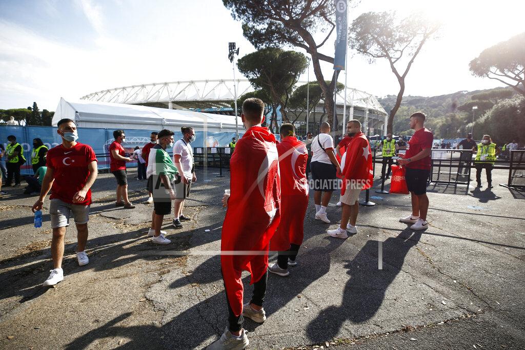 Cecilia Fabiano Turkish supporters gather prior to the Euro 2020 group A soccer match between Italy and Turkey, outside the Olympic stadium in Rome, Friday, June 11, 2021. The Euro 2020 gets underway on Friday and is being played in 11 host cities across 11 countries. The event was delayed by one year after being postponed in 2020 due to the COVID-19 pandemic. (Cecilia Fabiano/LaPresse via AP)