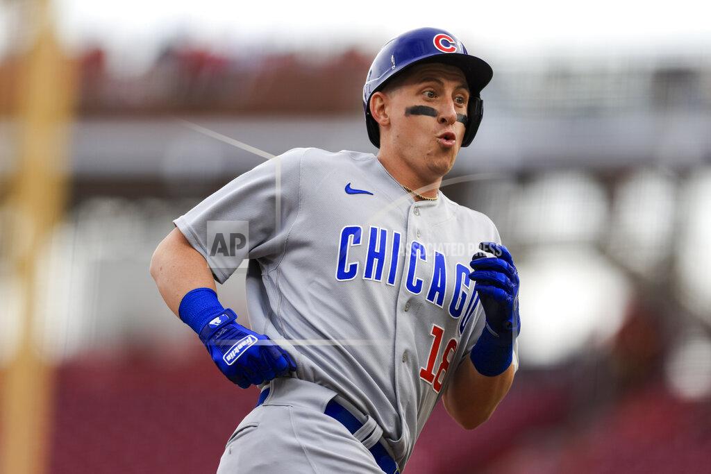 Aaron Doster Chicago Cubs' Frank Schwindel reacts as he runs the bases after hitting a two-run home run during the first inning of a baseball game against the Cincinnati Reds in Cincinnati, Tuesday, May 24, 2022. (AP Photo/Aaron Doster)