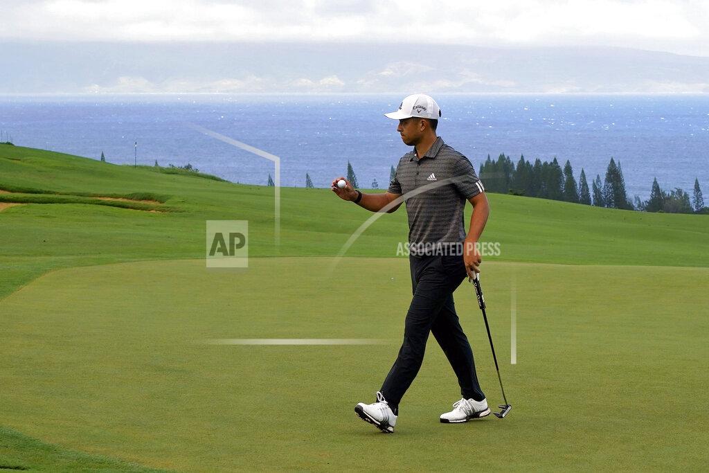 Matt York FILE - Xander Schauffele acknowledges the gallery after putting on the fourth green during the third round of the Tournament of Champions golf event at Kapalua Plantation Course in Kapalua, Hawaii, in this Saturday, Jan. 4, 2020, file photo. Schauffele is among 16 players in the Tournament of Champions who didn't win last year. (AP Photo/Matt York, File)