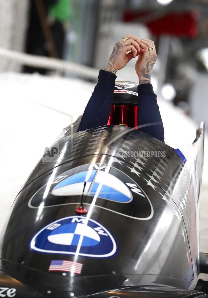 Matthias Schrader United State's bobsleigh pilot Kaillie Humphries at the start of the women's monobob race at the Bobsleigh and Skeleton World Championships in Altenberg, Germany, Saturday, Feb.13, 2021. (AP Photo/Matthias Schrader)