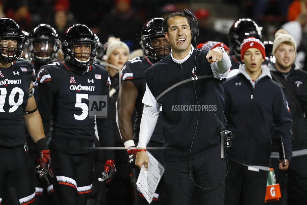 John Minchillo FILE - In this Saturday, Nov. 10, 2018, file photo, Cincinnati head coach Luke Fickell reacts to an official's call during the first half of an NCAA college football game against South Florida in Cincinnati. UCF and Cincinnati are Top 25 teams eager to show college football fans what they and the American Athletic Conference are all about. The undefeated, 11th-ranked UCF Knights and once-beaten No. 19 Bearcats take a shot at stating their case this week in a primetime, nationally televised matchup with league championship implications.
(AP Photo/John Minchillo, File)