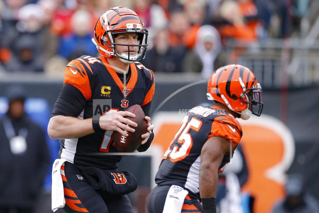 Gary Landers Cincinnati Bengals quarterback Andy Dalton (14) looks to pass in the first half of an NFL football game against the New England Patriots, Sunday, Dec. 15, 2019, in Cincinnati. (AP Photo/Gary Landers)