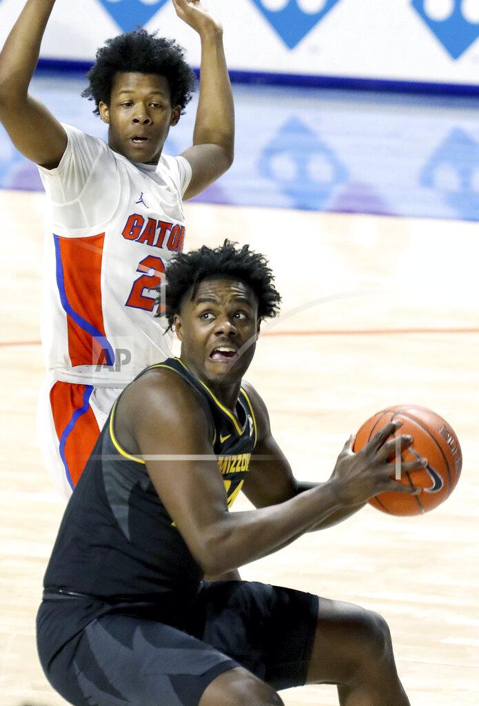 Brad Mcclenny Missouri forward Kobe Brown (24) looks for a shot during an NCAA college basketball game against Florida, Wednesday, March 3, 2021 in Gainesville, Fla. (Brad McClenny/The Gainesville Sun via AP)