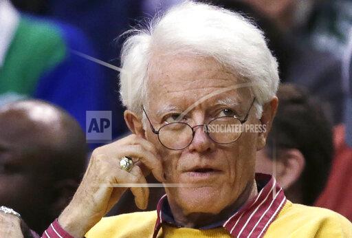 FILE - Former Fidelity Magellan fund manager Peter Lynch is seated during the second quarter of an NBA basketball game in Boston, Wednesday, Feb. 3, 2016. Boston College announced that works of art by Pablo Picasso, Mary Cassatt and Winslow Homer are among 30 pieces of art worth more than $20 million that Lynch, alumnus and legendary investment manager, is donating to Boston College's art museum. (AP Photo/Charles Krupa, File)