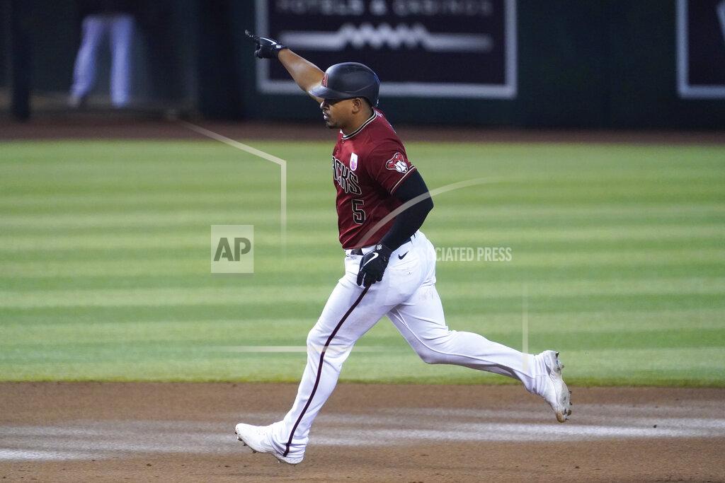 Rick Scuteri Arizona Diamondbacks' Eduardo Escobar reacts after hitting a three-run home run against the San Diego Padres in the eighth inning during a baseball game, Sunday, Aug 16, 2020, in Phoenix. (AP Photo/Rick Scuteri)