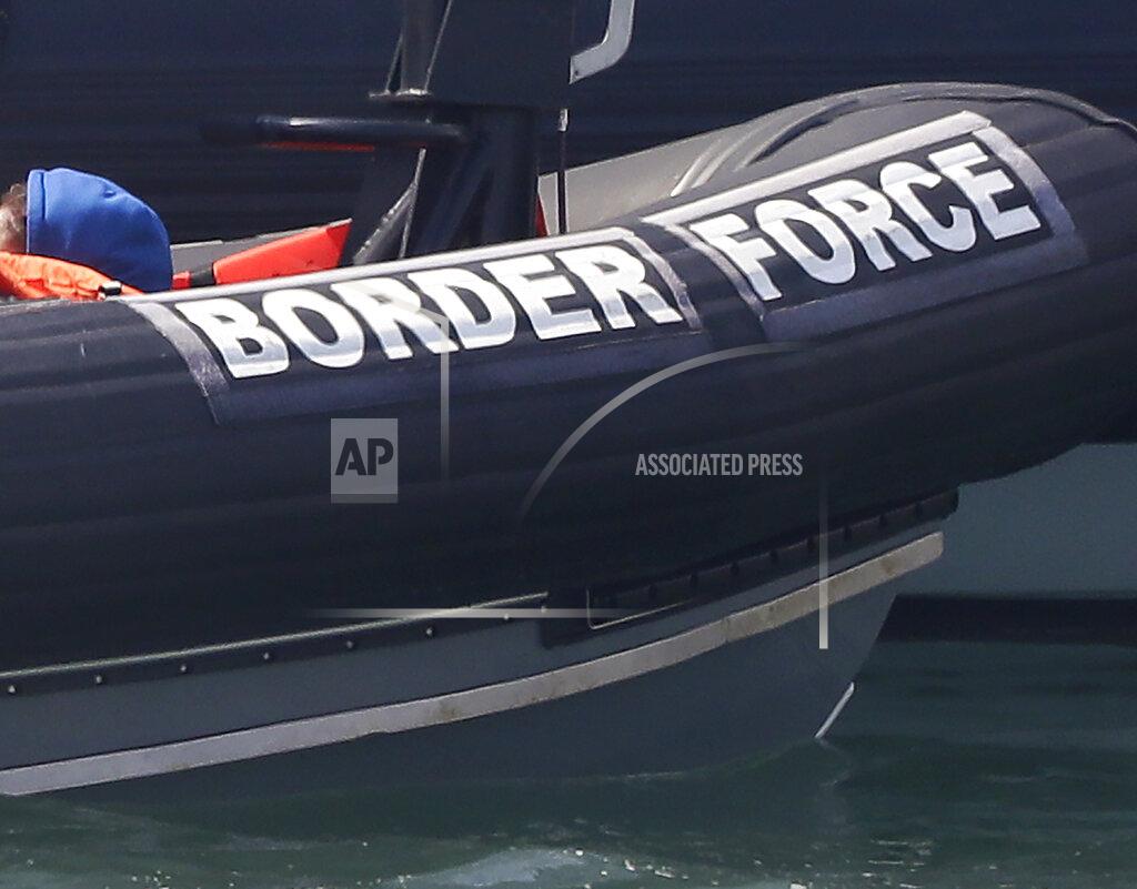 Kirsty Wigglesworth FILE - In this file photo dated Saturday Aug. 8, 2020, a Border Force vessel at the port city of Dover, England. Fifteen migrants have been saved Tuesday Oct. 27, 2020, as search and rescue operations by the Border Force continue, but at least four migrants, including a 5-year-old and 8-year-old child, have died Tuesday when their boat capsized while they and other migrants tried to cross the English Channel to Britain, French authorities said. (AP Photo/Kirsty Wigglesworth, FILE)