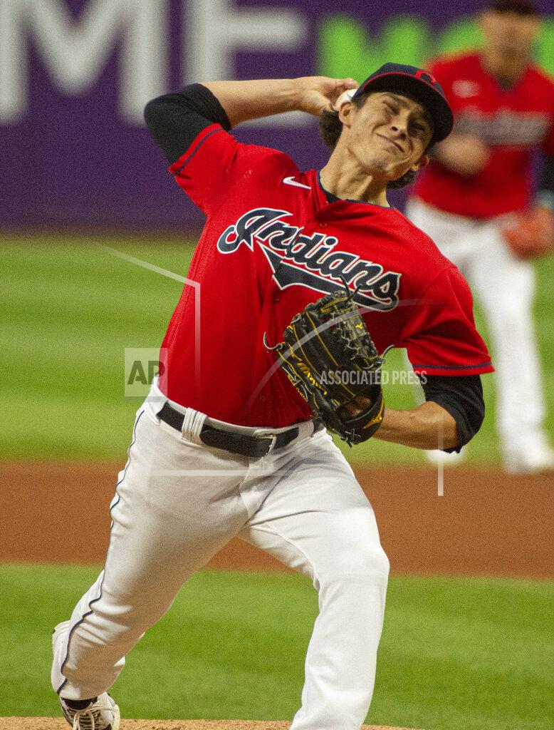 Phil Long Cleveland Indians starting pitcher Eli Morgan delivers against the Chicago White Sox during the first inning of a baseball game in Cleveland, Saturday, Sept. 25, 2021. (AP Photo/Phil Long)