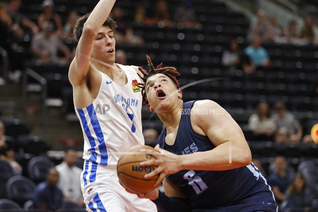 Jeff Swinger Memphis Grizzlies forward Kenny Lofton Jr. (6) looks to shoot against Oklahoma City Thunder forward Chet Holmgren (7) during the first half of an NBA summer league basketball game Wednesday, July 6, 2022, in Salt Lake City. (AP Photo/Jeff Swinger)