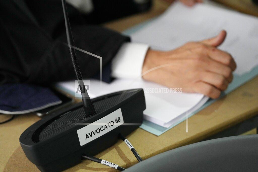 Antonio Calanni A Lawyer attends the opening of the first hearing of the trial for the Morandi bridge collapse at the Genoa's Palace of Justice Thursday, July 7, 2022. Forty-three people were killed when a large stretch of the Morandi Bridge broke off, August 14, 2018, on the eve of one of Italy's biggest vacation holidays. (AP Photo/Antonio Calanni)