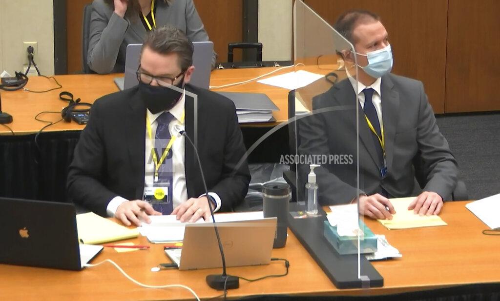 Uncredited In this image from video, defense attorney Eric Nelson, left, and defendant, former Minneapolis police Officer Derek Chauvin, right, listen as Hennepin County Judge Peter Cahill presides Thursday April 8, 2021, in the trial of Chauvin at the Hennepin County Courthouse in Minneapolis, Minn. Chauvin is charged in the May 25, 2020 death of George Floyd. (Court TV via AP, Pool)