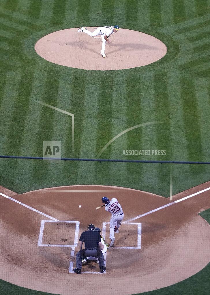 Tony Avelar Oakland Athletics pitcher Chris Bassitt (40) works against the Houston Astros' Michael Brantley (23) in the first inning of an opening day baseball game Oakland, Calif., Thursday, April 1, 2021. (AP Photo/Tony Avelar)