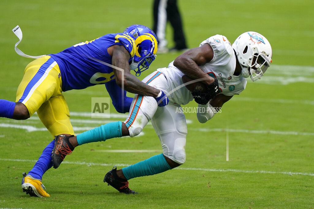 Lynne Sladky Miami Dolphins free safety Eric Rowe (21) intercepts a pass intended for Los Angeles Rams tight end Gerald Everett (81), during the first half of an NFL football game, Sunday, Nov. 1, 2020, in Miami Gardens, Fla. (AP Photo/Lynne Sladky)