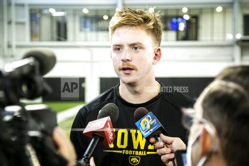 Iowa quarterback Spencer Petras speaks to reporters ahead of the NCAA college football Big Ten Championship against Michigan, Tuesday, Nov. 30, 2021, at the Hansen Football Performance Center in Iowa City, Iowa. (Joseph Cress/Iowa City Press-Citizen via AP)