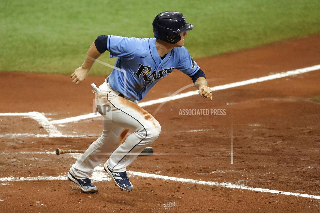 Mike Carlson Tampa Bay Rays' Joey Wendle starts to run after hitting an RBI-single against the Philadelphia Phillies during the third inning of a baseball game Sunday, Sept. 27, 2020, in St. Petersburg, Fla. (AP Photo/Mike Carlson)