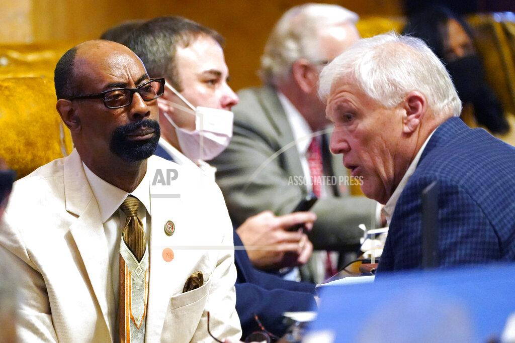 Rogelio V. Solis Rep. Gregory Holloway, D-Hazlehurst, left, confers with Rep. Jim Beckett, R-Bruce, in the House Chamber at the Capitol in Jackson, Miss., Tuesday, March 30, 2021. Lawmakers in both chambers worked steadily to meet deadlines on the remaining legislation to be completed this session. (AP Photo/Rogelio V. Solis)