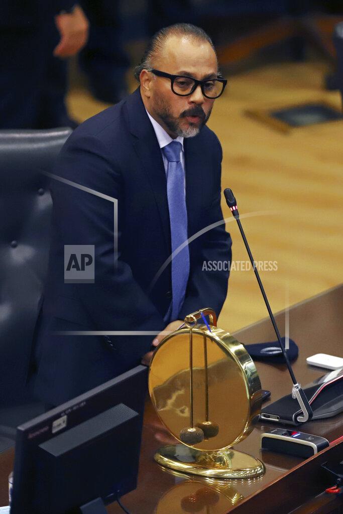Salvador Melendez New Ideas party lawmaker Ernesto Castro delivers his speech after sworn-in as president of the El Salvador's Congress in San Salvador, El Salvador, Saturday, May 1, 2021. For the first time in three decades the traditional conservative and leftist parties have been sidelined by a resounding electoral defeat, clearing the way for President Nayib Bukele's party to help him advance his agenda. (AP Photo/Salvador Melendez)